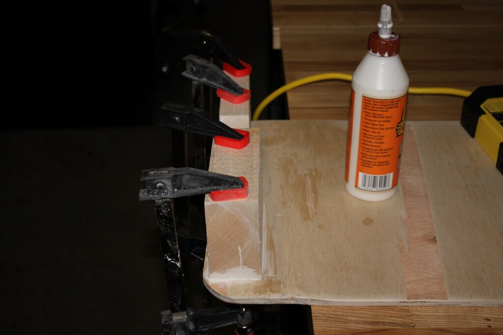 Gluing wood blocks to bottom of board