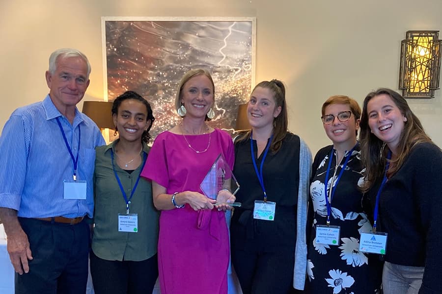 AU prof Karch with students Amenti Bekere (2nd from left), Rotem Miloh (4th from left), and Adira Brenner (6th from left) at Hero22.