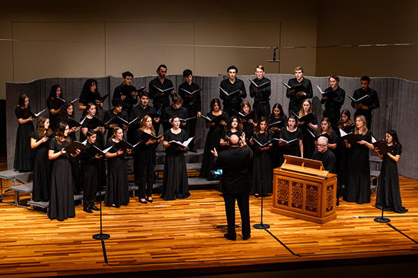 Dan Abraham conducting choir