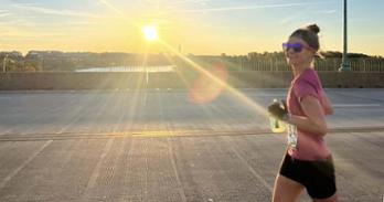 Dara Ford running across bridge in Marine Corps Marathon 2024