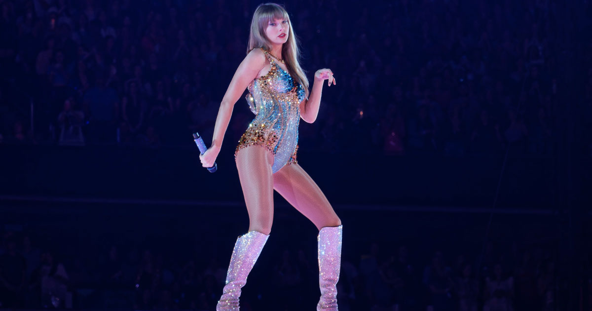 Taylor Swift performing at Eras Tour. Photo by Ronald Woan