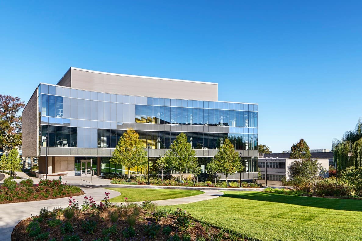 Wide shot of The Hall of Science Outside Facade with blue skies