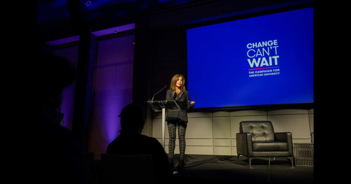 Jill Black delivers a speech at a podium at a Change Can't Wait event