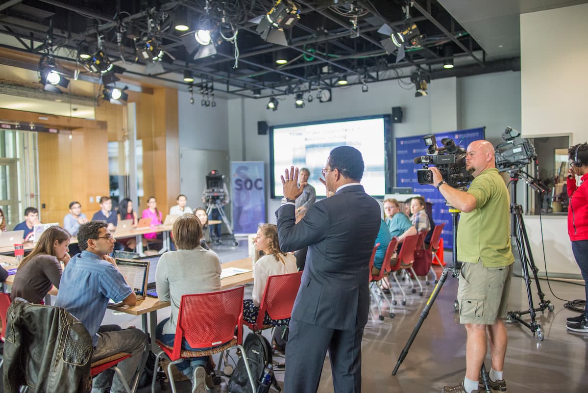 Bruce Johnson lectures American University students in the School of Communication.