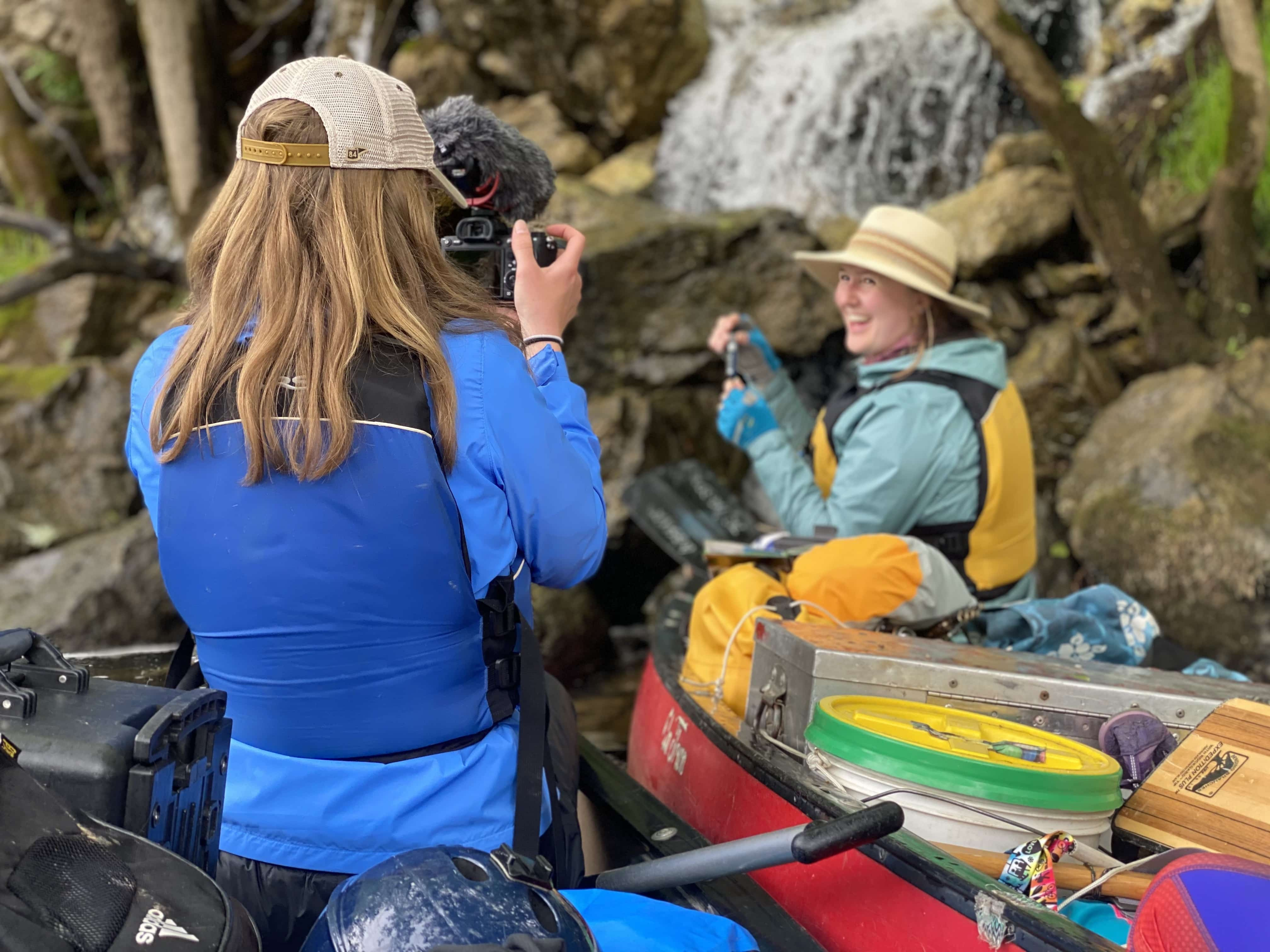 Woman taking a photograph