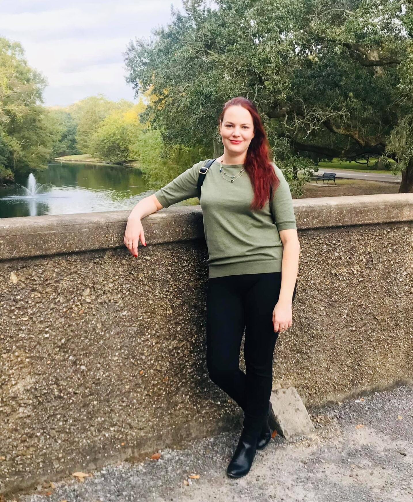 Photo of Elise standing in green shirt