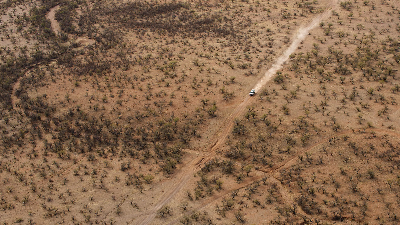 US Border Patrol truck tears across the Sonoran Desert