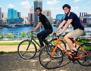 Nik and Paul near their bikes on Federal Hill in Baltimore