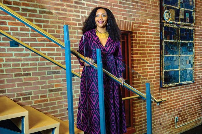 Chanel Johnson on the steps of the Banneker-Douglass-Tubman Museum