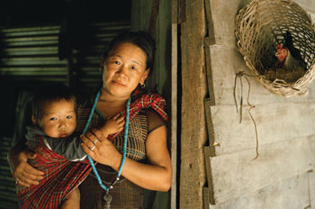 A woman holds her baby in India