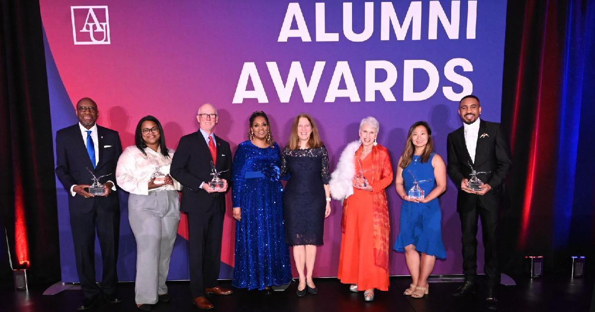 Portrait of alumni award honorees and Sylvia Burwell