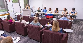 Students on a panel at AU's second experiential learning conference.