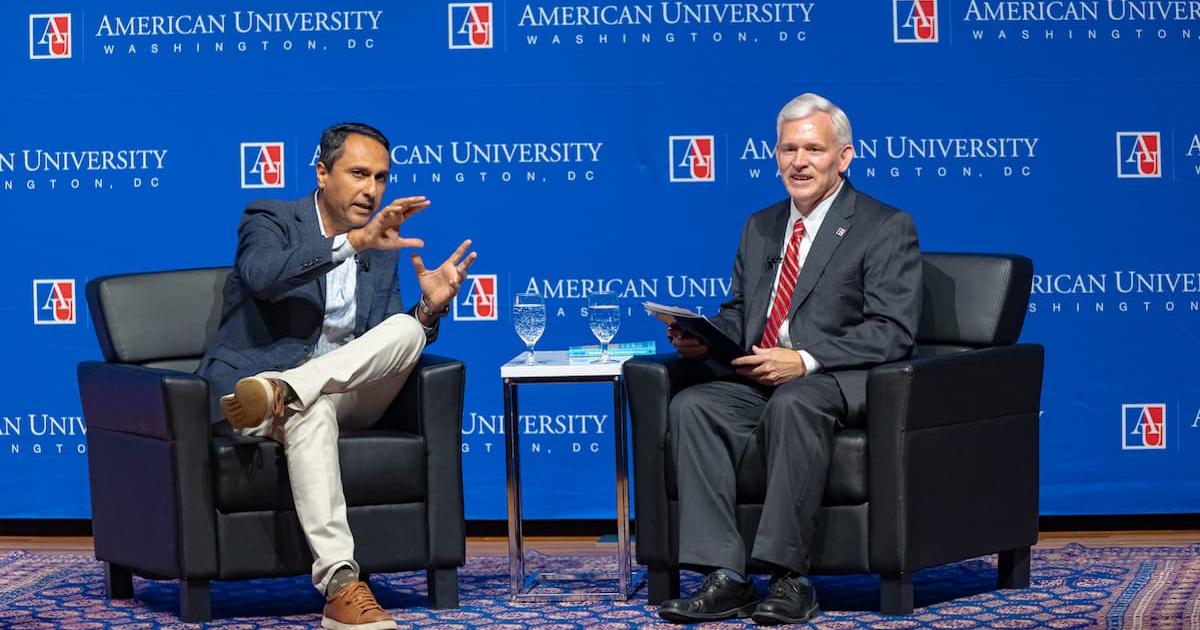 From left, Eboo Patel and President Jon Alger talk at the Katzen Arts Center’s Abramson Family Recital Hall. Photo by Jeff Watts.