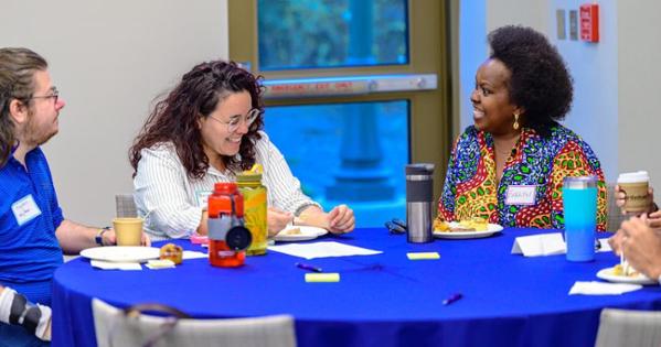 AU staff share a laugh at the Dialogue Across Differences event. Photo by Jeff Watts. 