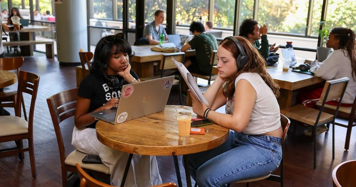 AU students sit at a table in the Bridge Cafe. Photos by Ethan Kauffman, SOC/BA ’26.