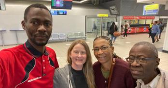 Second from left, Jennifer Gardner, SIS/BA '05, reconnects with her host family in Windhoek, Namibia. Photo courtesy of Jennifer Gardner.