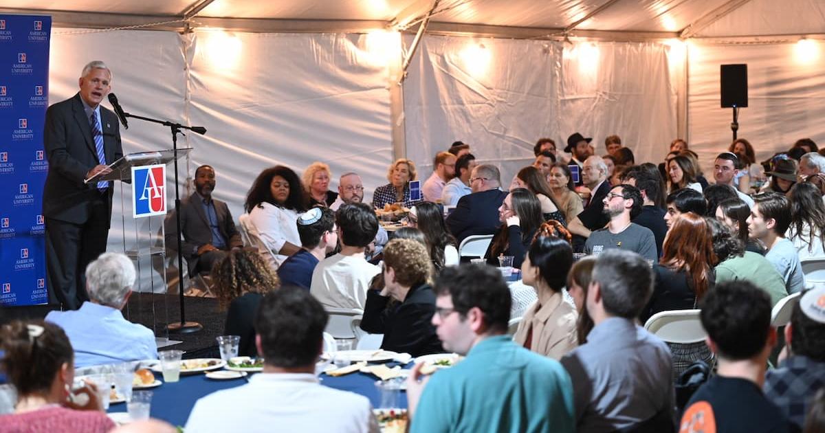 AU President Jon Alger speaks during the Unity Meal. Photo by Jeff Watts.