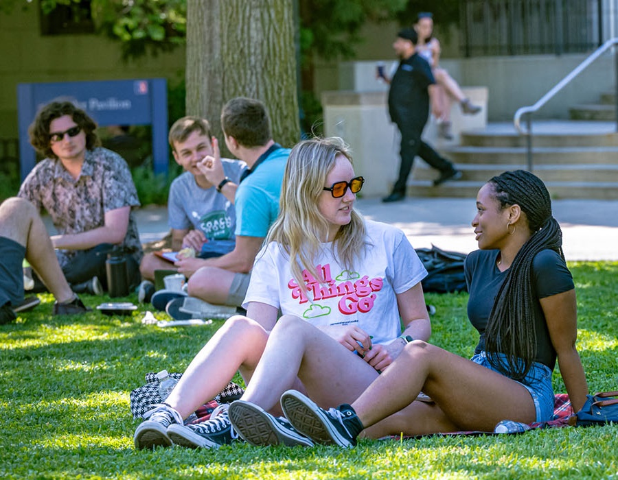 students sitting on quad