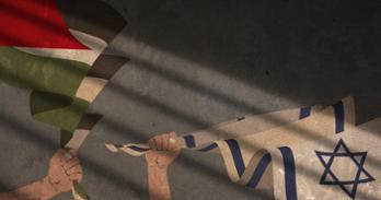 Flags of Israel and Palestine, each held by a fist, painted on a concrete wall.