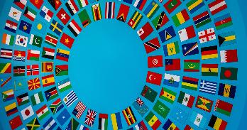 A series of country flags are shown in a circle design