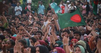 Protestors with a Bangladesh flag