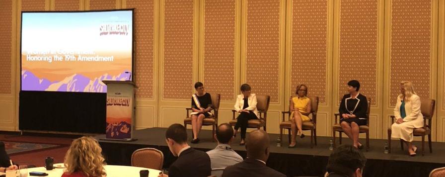 Lucy Gettman sits with the other panelists for a discussion about the centennial celebration of women's suffrage