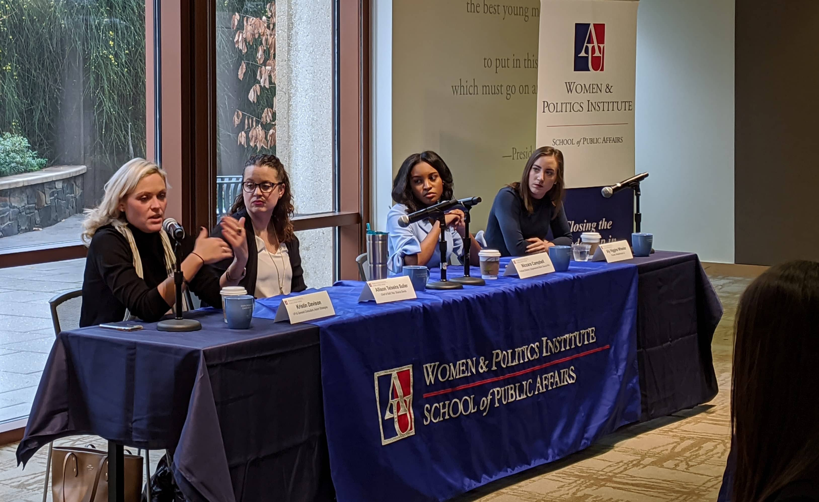 Kristin, Allison, Niccara, and Aly seated on the panel.