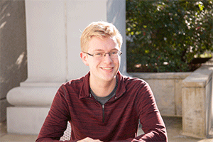 First year student, Harrision Eichelberger in front of Kerwin Hall.