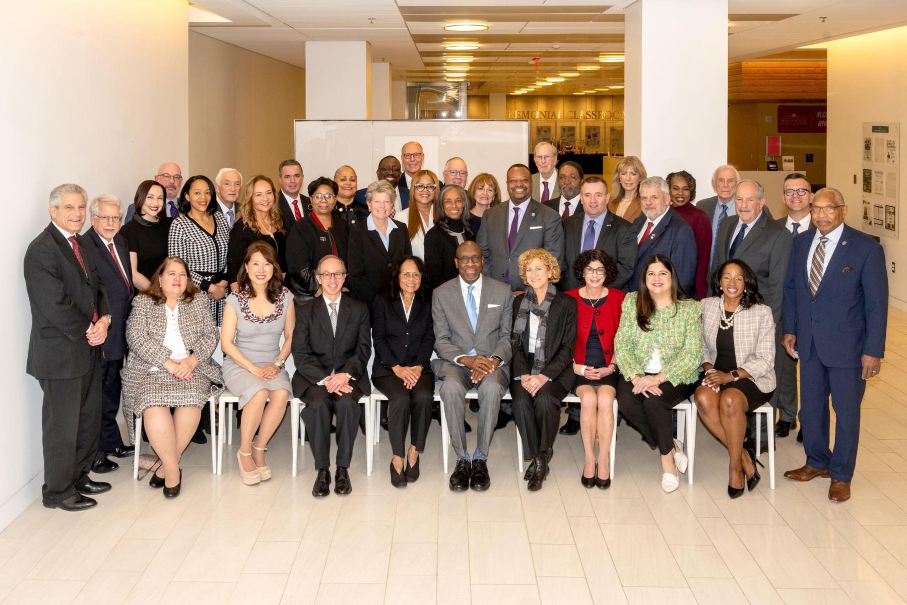 Group photo of alumni judges present for the event